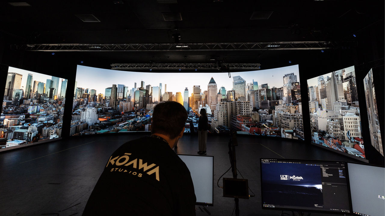Image of a studio technician working in front of Kōawa Studios virtual production screen