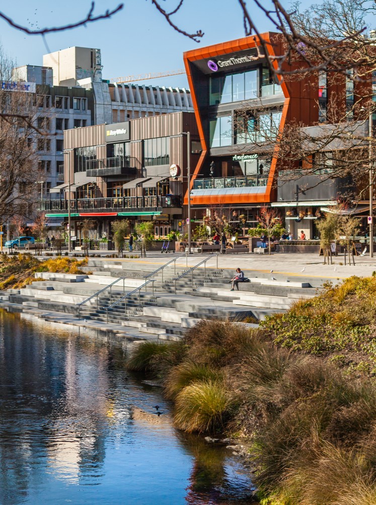 An image of the Grant Thornton building across Christchurch's Avon River waterfront in the CBD