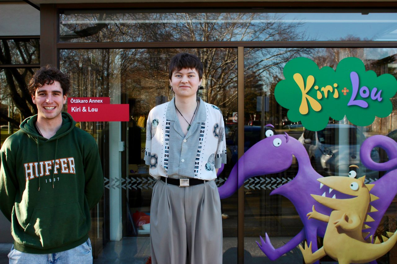 2x UC interns in front of the Kiri and Lou HQ
